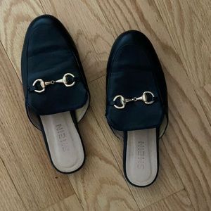 Horsebit black mules